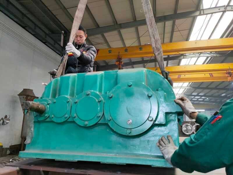 Workers assembling a recycling machine in the BSGH workshop