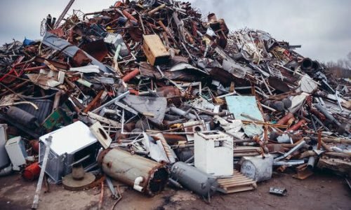 Heap of metal items on a scrap yard in Warsaw, capital city of Poland