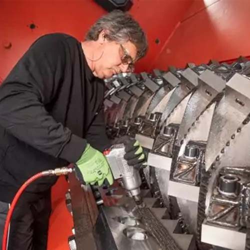 Shredder-Blade-inspected-by-technician Shredder-Blade-inspected-by-technician